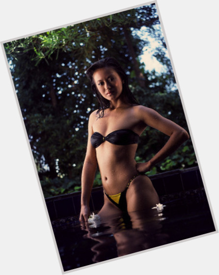 Julia Nickson shirtless bikini