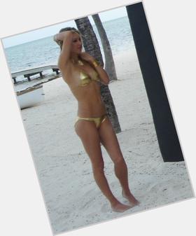 Anna Kournikova blonde hair & hairstyles Athletic body, 