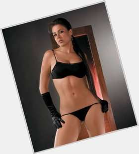 Carla Giraldo Athletic body,  light brown hair & hairstyles