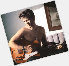 Chris Isaak dark brown hair & hairstyles Athletic body, 