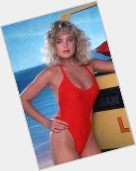 Erika Eleniak Slim body,  blonde hair & hairstyles