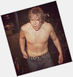 Jon Moxley Athletic body,  light brown hair & hairstyles