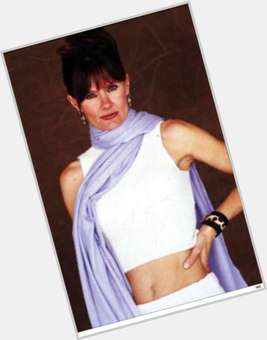 Lynn Herring Slim body,  dark brown hair & hairstyles