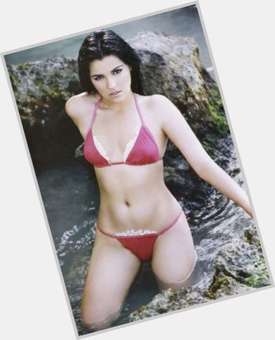 Maite Perroni Average body,  dark brown hair & hairstyles