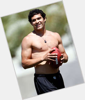 Mark Sanchez Athletic body,  black hair & hairstyles