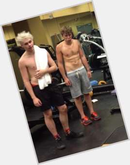 Michael Clifford Slim body,  multi-colored hair & hairstyles