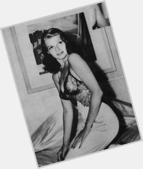 Rita Hayworth Voluptuous body,  dyed red hair & hairstyles