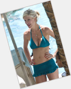 Tori Spelling Slim body,  dyed blonde hair & hairstyles