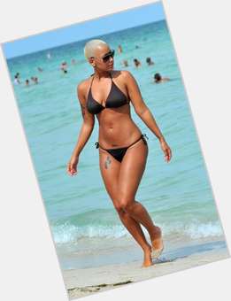 Amber Rose Voluptuous body,  bald hair & hairstyles