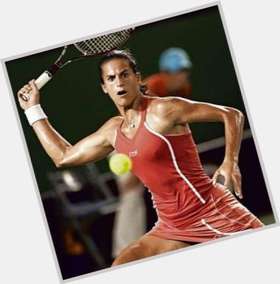 Amelie Mauresmo dark brown hair & hairstyles Athletic body, 