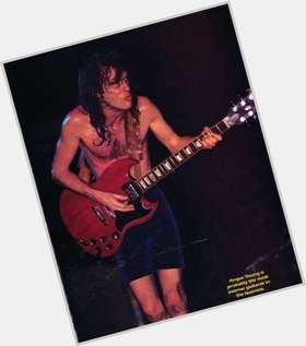 Angus Young Average body,  dark brown hair & hairstyles