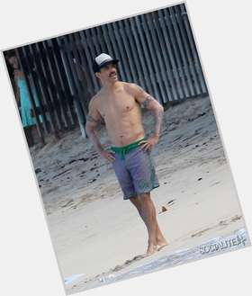 Anthony Kiedis dark brown hair & hairstyles Athletic body, 