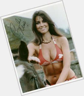 Caroline Munro Voluptuous body,  dark brown hair & hairstyles