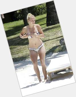Caroline Wozniacki Athletic body,  blonde hair & hairstyles