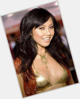 Christine Nguyen Slim body,  dark brown hair & hairstyles
