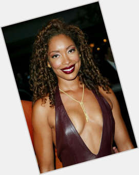 Gina Torres Slim body,  dark brown hair & hairstyles