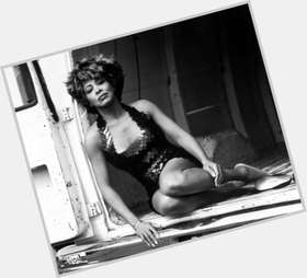 Tina Turner dark brown hair & hairstyles Athletic body, 