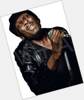 Jimmy Cliff Average body,  black hair & hairstyles