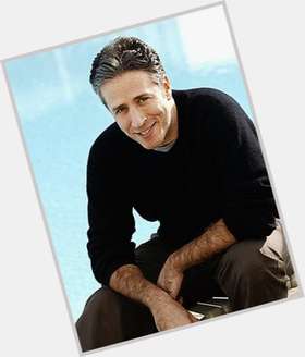 Jon Stewart Average body,  salt and pepper hair & hairstyles