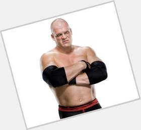 Kane Athletic body,  bald hair & hairstyles