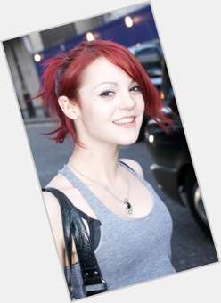 Kathryn Prescott Slim body,  dyed red hair & hairstyles