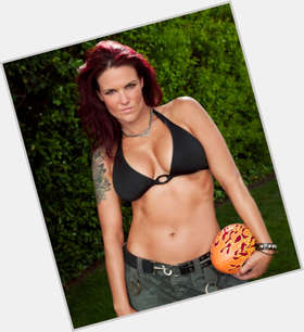 Lita Athletic body,  dyed red hair & hairstyles