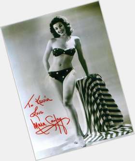 Mara Corday Average body,  dark brown hair & hairstyles