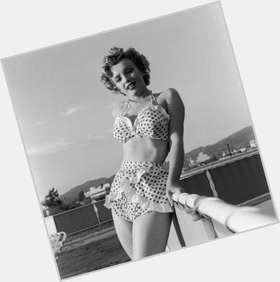 Marilyn Monroe Voluptuous body,  dyed blonde hair & hairstyles