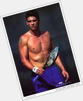 Mark Philippoussis Athletic body,  black hair & hairstyles