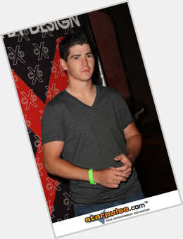 Michael Fishman Average body,  dark brown hair & hairstyles