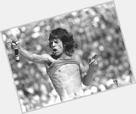 Mick Jagger Slim body,  dark brown hair & hairstyles