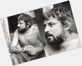 Oliver Reed Large body,  black hair & hairstyles