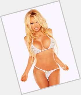 Pamela Anderson Athletic body,  dyed blonde hair & hairstyles