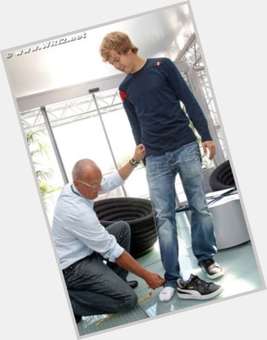 Sebastian Vettel Athletic body,  light brown hair & hairstyles