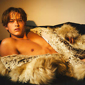 Deacon Phillippe Bares All in Fur Coat for \
