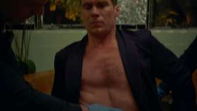 Pete Ploszek shirtless in 9-1-1 1-07
