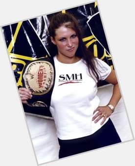 Stephanie McMahon-Helmsley dark brown hair & hairstyles Athletic body, 