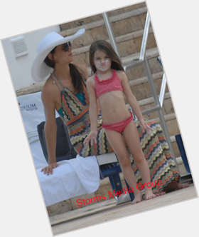 Suri Cruise Slim body,  dark brown hair & hairstyles