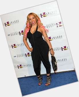 Tameka Tiny Cottle Average body,  dyed blonde hair & hairstyles