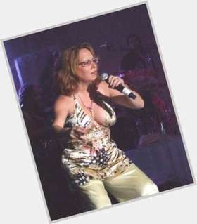 Teena Marie Average body,  light brown hair & hairstyles