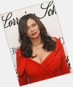 Tina Knowles Voluptuous body,  dark brown hair & hairstyles