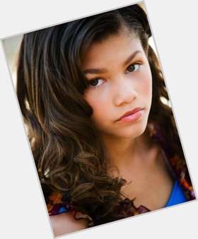 Zendaya Athletic body,  dark brown hair & hairstyles